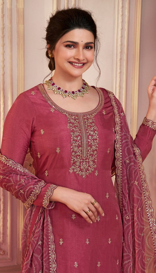 Tasteful Maroon Color Georgette Fabric Partywear Suit