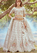 Desirable Cream Color Tissue Fabric Party Wear Lehenga