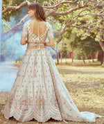 Desirable Cream Color Tissue Fabric Party Wear Lehenga