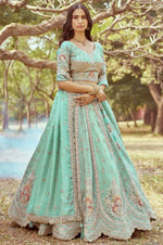 Desirable Green Color Tissue Fabric Party Wear Lehenga