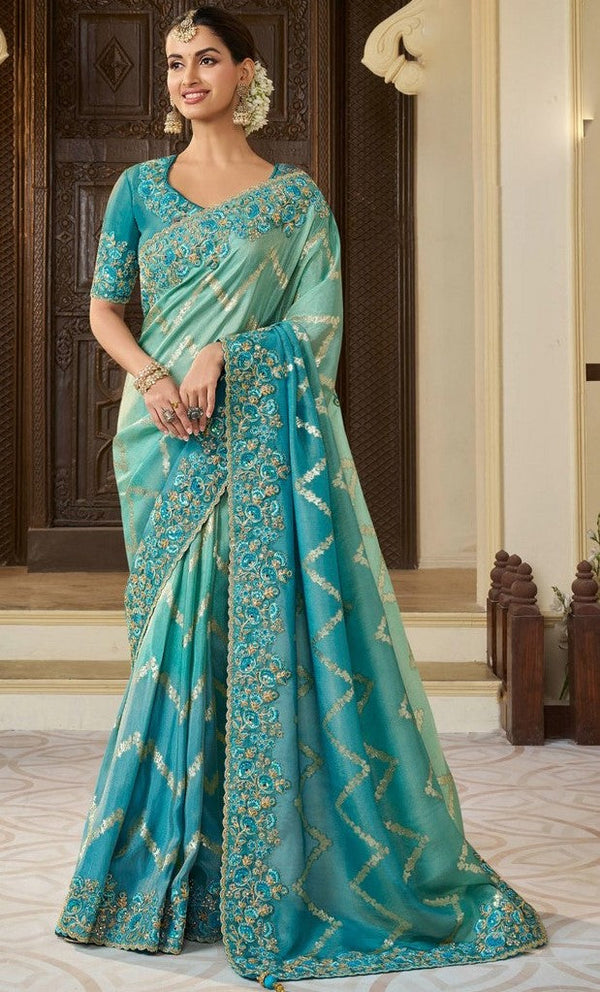 Pretty Turquoise Color Viscose Fabric Partywear Saree