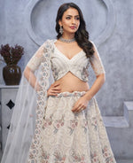 Dazzling White Color Net Fabric Party Wear Lehenga