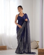 Dazzling Blue Color Georgette Fabric Partywear Saree