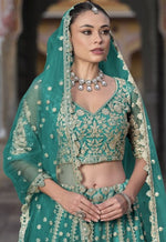 Dazzling Turquoise Color Net Fabric Party Wear Lehenga