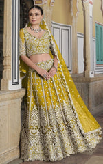 Dazzling Yellow Color Net Fabric Party Wear Lehenga