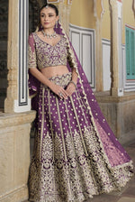 Dazzling Purple Color Net Fabric Party Wear Lehenga