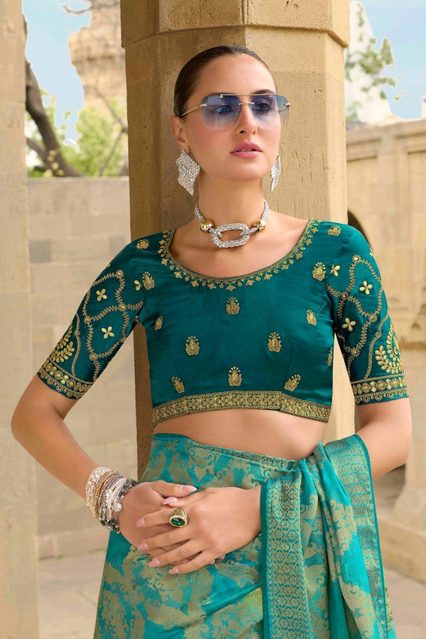 Beauteous Turquoise Color Jacquard Fabric Partywear Saree