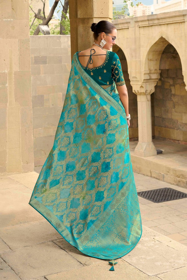 Beauteous Turquoise Color Jacquard Fabric Partywear Saree