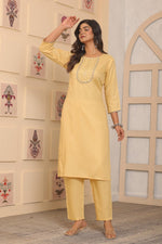 Dazzling Yellow Color Rayon Fabric Designer Kurti with Bottom