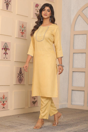 Dazzling Yellow Color Rayon Fabric Designer Kurti with Bottom