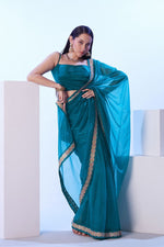 Dazzling Turquoise Color Net Fabric Designer Saree