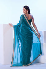 Dazzling Turquoise Color Net Fabric Designer Saree