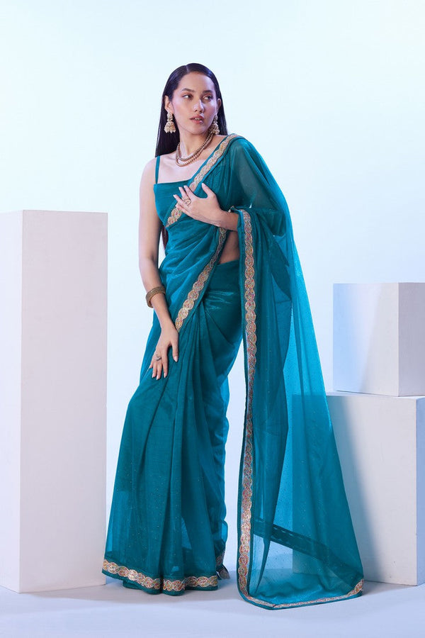 Dazzling Turquoise Color Net Fabric Designer Saree