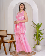 Dazzling Pink Color Rayon Fabric Designer Kurti With Bottom