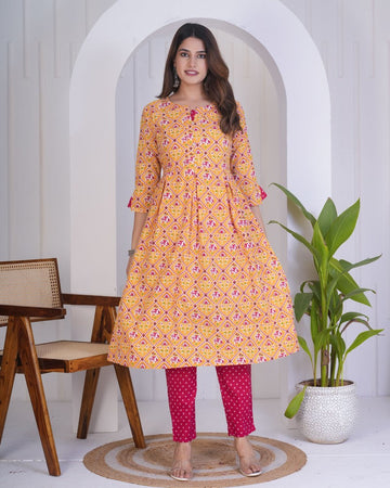 Dazzling Mustard Color Cotton Fabric Designer Kurti With Bottom