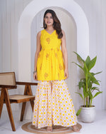 Dazzling Yellow Color Rayon Fabric Designer Kurti With Bottom