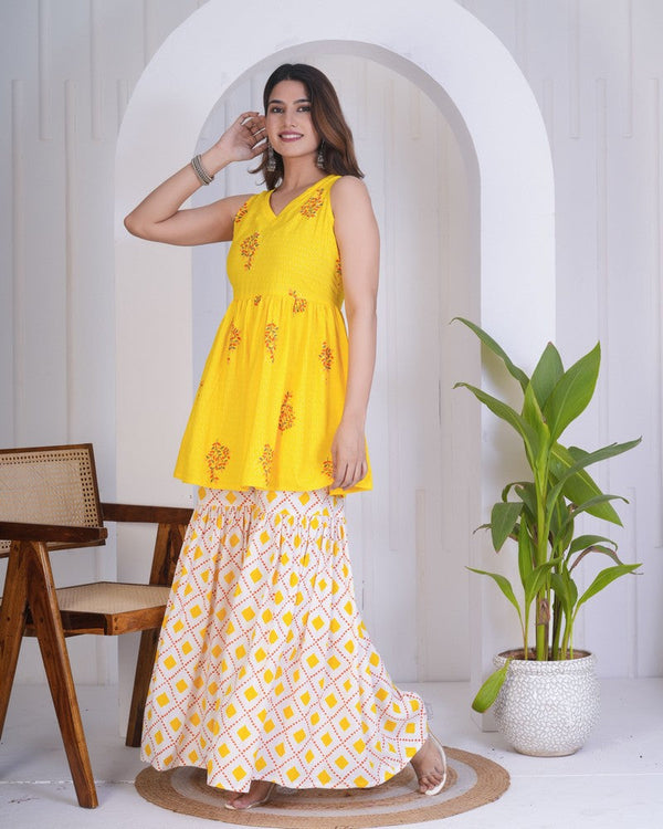 Dazzling Yellow Color Rayon Fabric Designer Kurti With Bottom