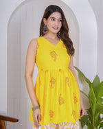 Dazzling Yellow Color Rayon Fabric Designer Kurti With Bottom