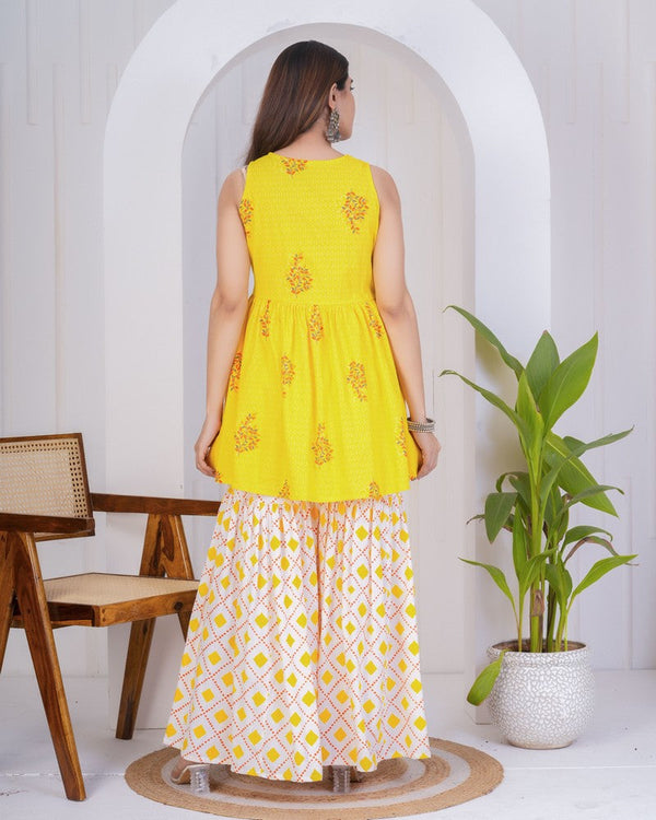 Dazzling Yellow Color Rayon Fabric Designer Kurti With Bottom