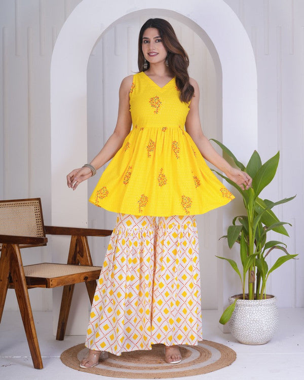 Dazzling Yellow Color Rayon Fabric Designer Kurti With Bottom