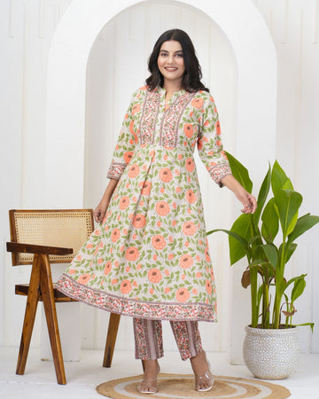 Dazzling Cream Color Cotton Fabric Designer Kurti With Bottom