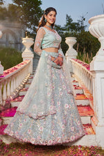 Dazzling Aqua Color Net Fabric Party Wear Lehenga