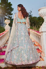 Dazzling Aqua Color Net Fabric Party Wear Lehenga