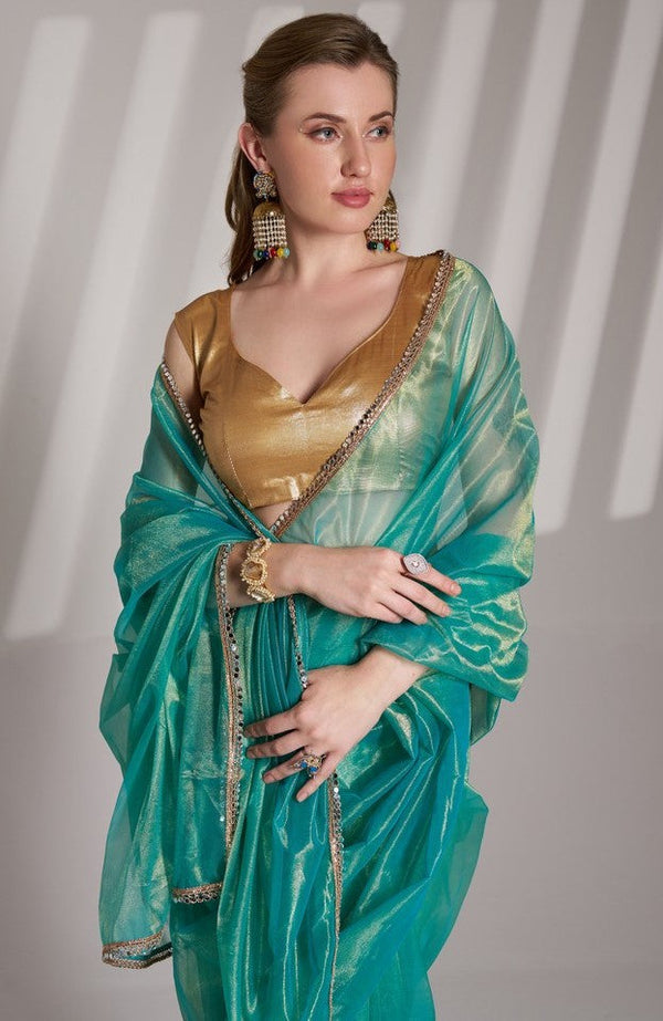 Grand Turquoise Color Net Fabric Casual Saree