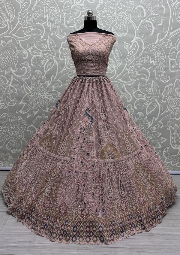 Amazing Peach Color Net Fabric Party Wear Lehenga