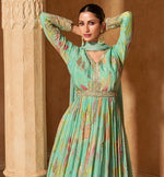 Gorgeous Green Color Chinon Fabric Partywear Suits