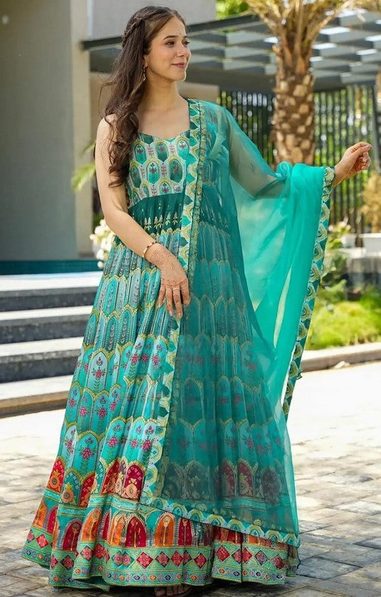 Striking Turquoise Color Silk Fabric Gown with Dupatta