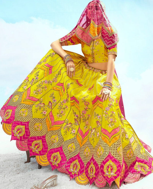 Divine Yellow Color Silk Fabric Party Wear Lehenga