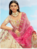 Divine Cream Color Silk Fabric Party Wear Lehenga