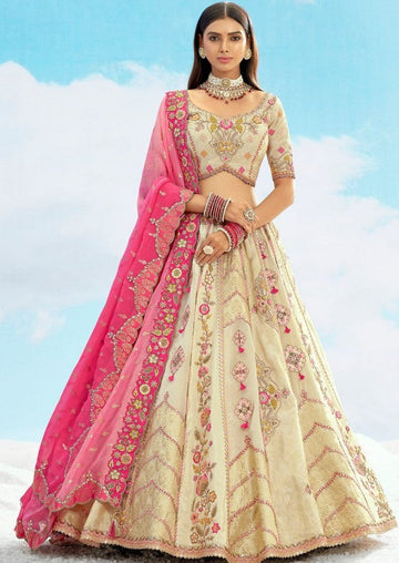 Divine Cream Color Silk Fabric Party Wear Lehenga