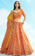 Divine Orange Color Silk Fabric Party Wear Lehenga