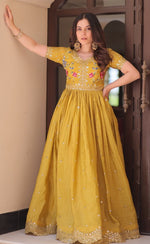 Dazzling Mustard Color Crush Fabric Gown