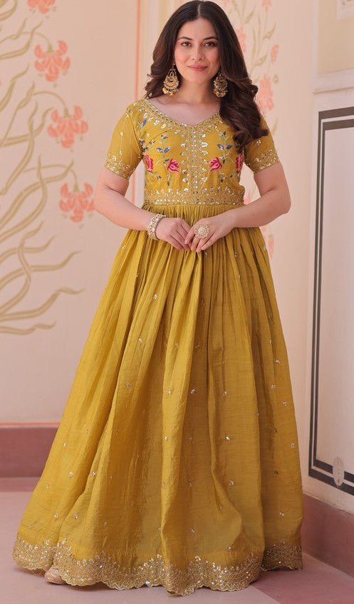 Dazzling Mustard Color Crush Fabric Gown