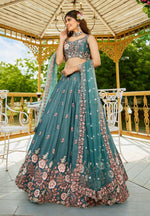 Striking Turquoise Color Satin Fabric Party Wear Lehenga