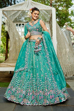 Striking Turquoise Color Tissue Fabric Party Wear Lehenga