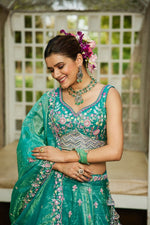 Striking Turquoise Color Tissue Fabric Party Wear Lehenga