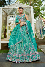 Striking Turquoise Color Tissue Fabric Party Wear Lehenga