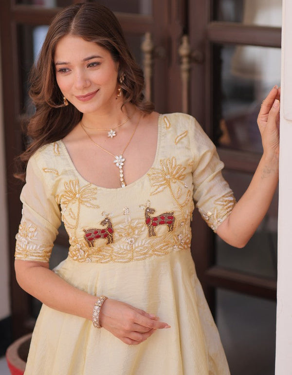 Striking Cream Color Crush Fabric Gown