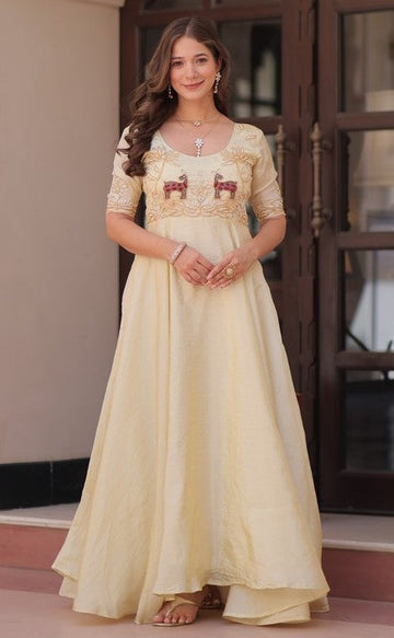Striking Cream Color Crush Fabric Gown