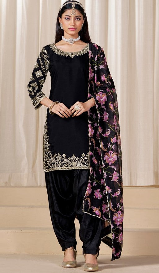 Tasteful Black Color Silk Fabric Patiala Suit
