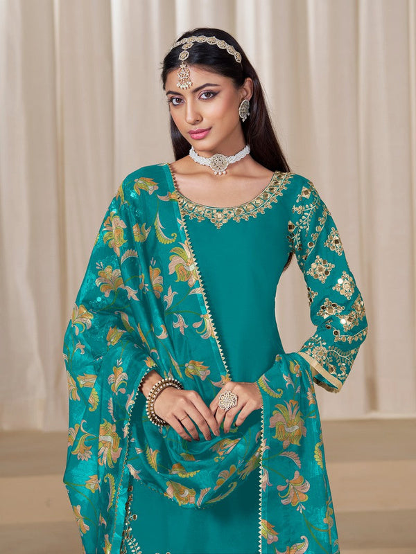 Tasteful Turquoise Color Silk Fabric Patiala Suit