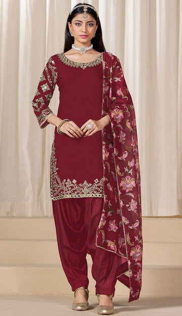 Tasteful Maroon Color Silk Fabric Patiala Suit