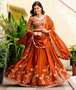Angelic Orange Color Silk Fabric Party Wear Lehenga