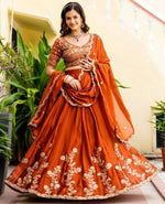 Angelic Orange Color Silk Fabric Party Wear Lehenga