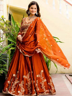 Angelic Orange Color Silk Fabric Party Wear Lehenga