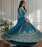 Beautiful Turquoise Color Net Fabric Party Wear Lehenga